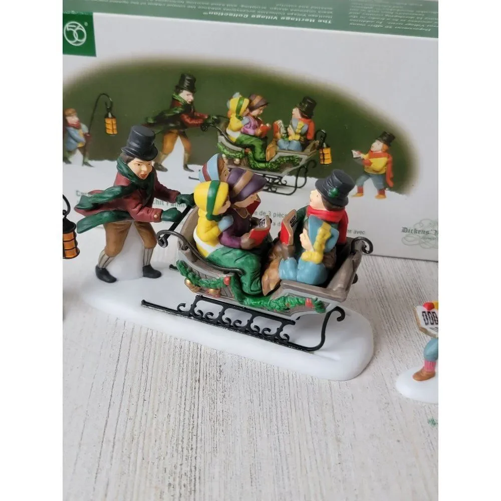 Dept 56 58396 Caroling With The Cratchit Family (Revisited) village accessory xm